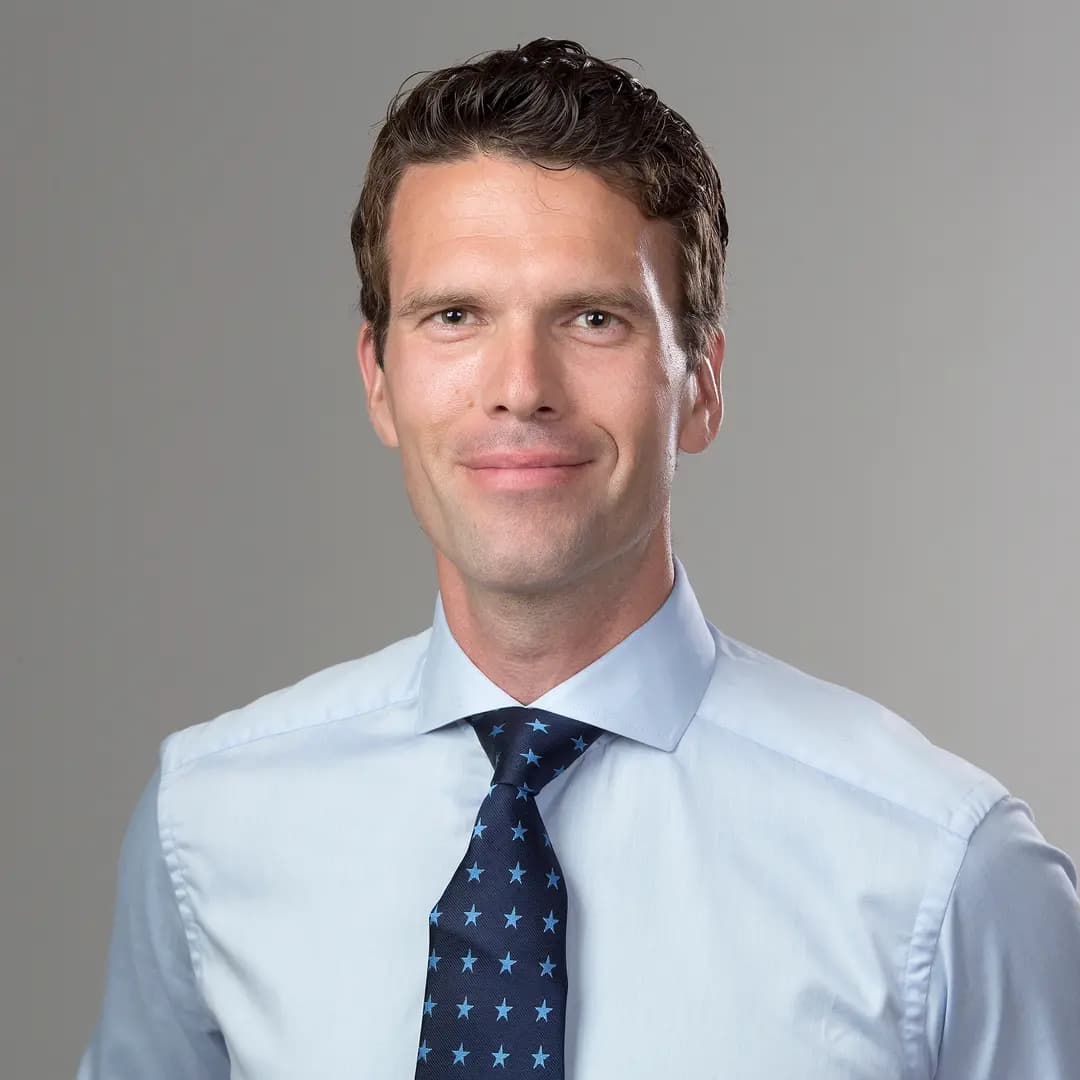 Portrait of Per Vedin wearing business attire